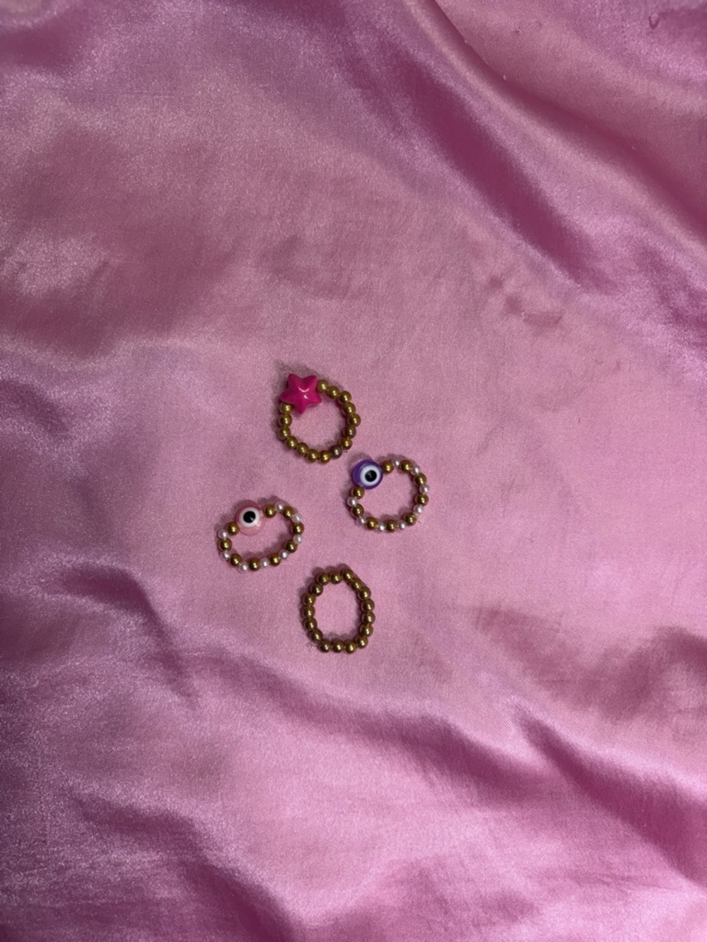 Gold Beaded Ring Set with Pink Star and Eye Charms